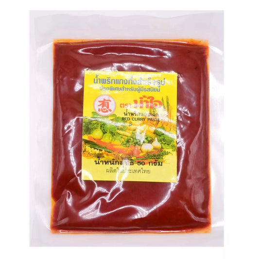 Namjai Red Curry Paste 50g – Authentic Thai curry paste in a vacuum-sealed pack with a label featuring fresh ingredients. Perfect for making traditional Thai red curry dishes.