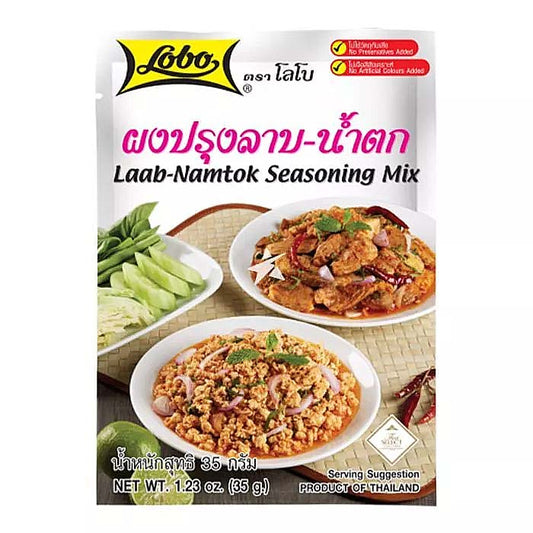 Front of the Lobo Laab-Namtok Seasoning Mix Packet – A 35g pack of Lobo Laab-Namtok Seasoning Mix featuring images of Laab and Namtok dishes, with fresh herbs and vegetables. The packaging highlights that the product contains no preservatives or artificial colours